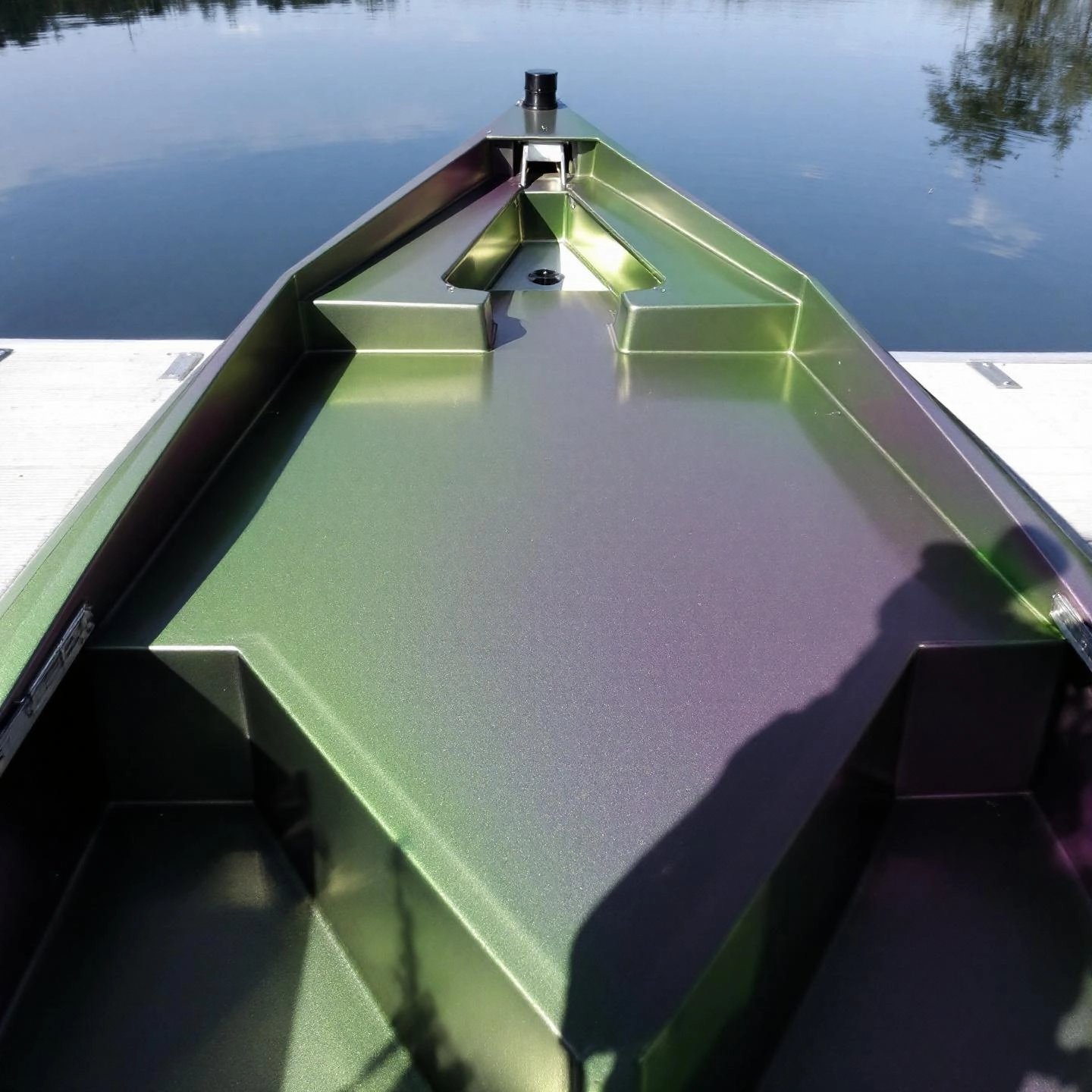 a freshly painted aluminum boat showcasing a flawless professional finish