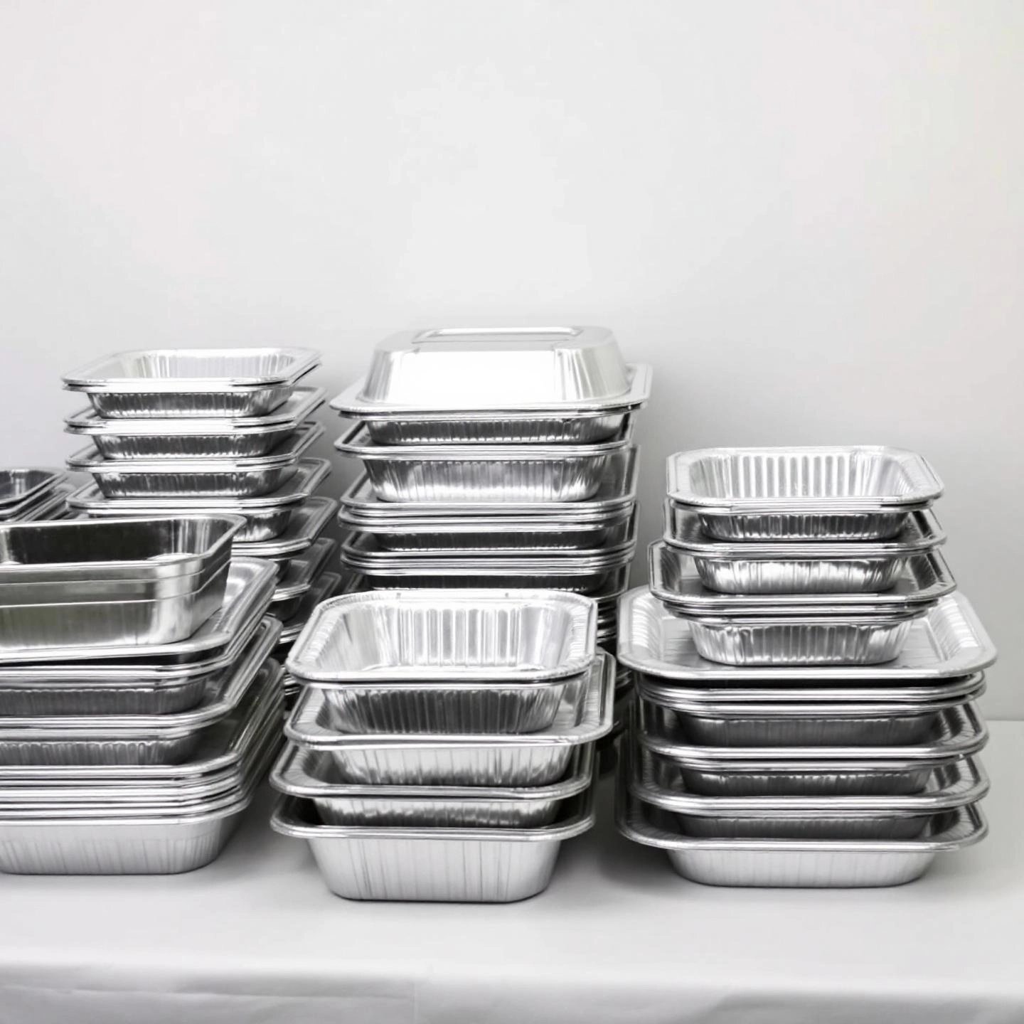 disposable aluminum foil pans in various shapes and thicknesses for convenient use