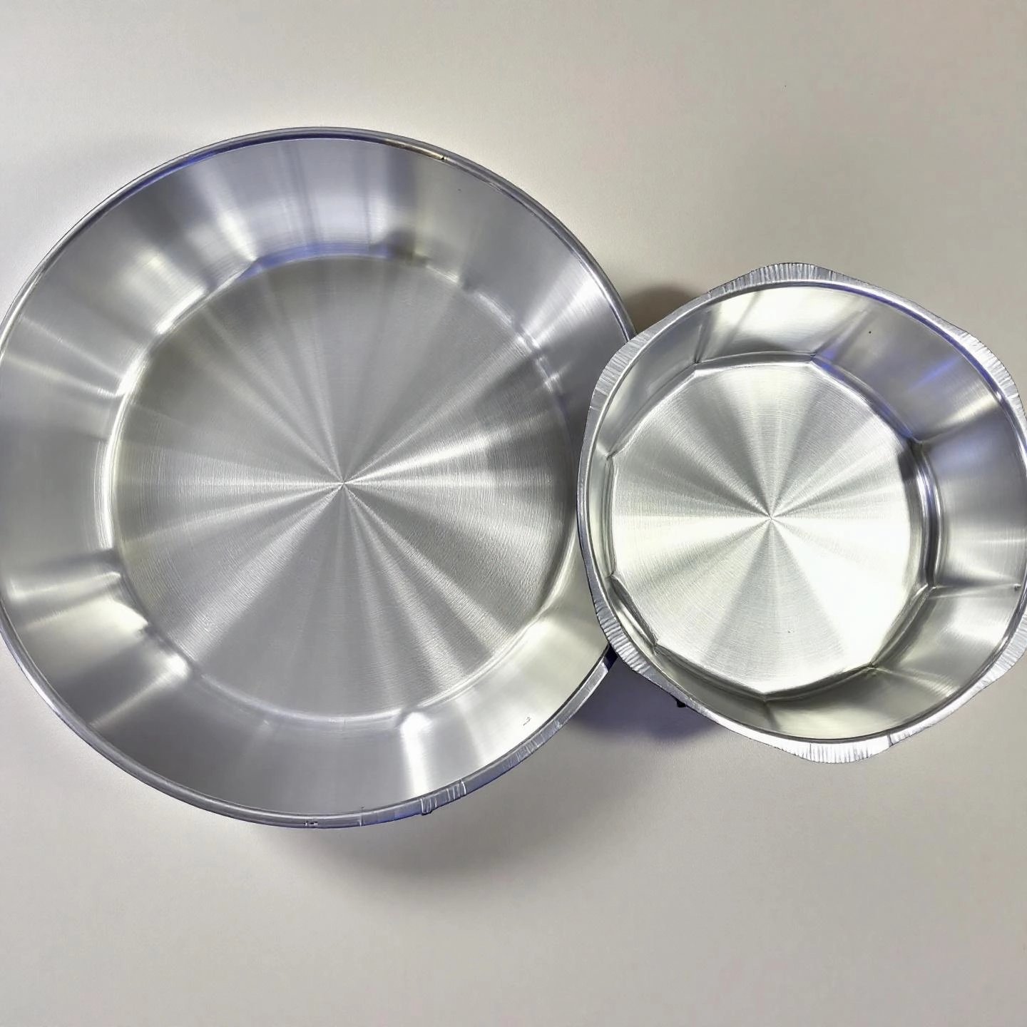 full size and half size aluminum pans shown side by side for easy comparison