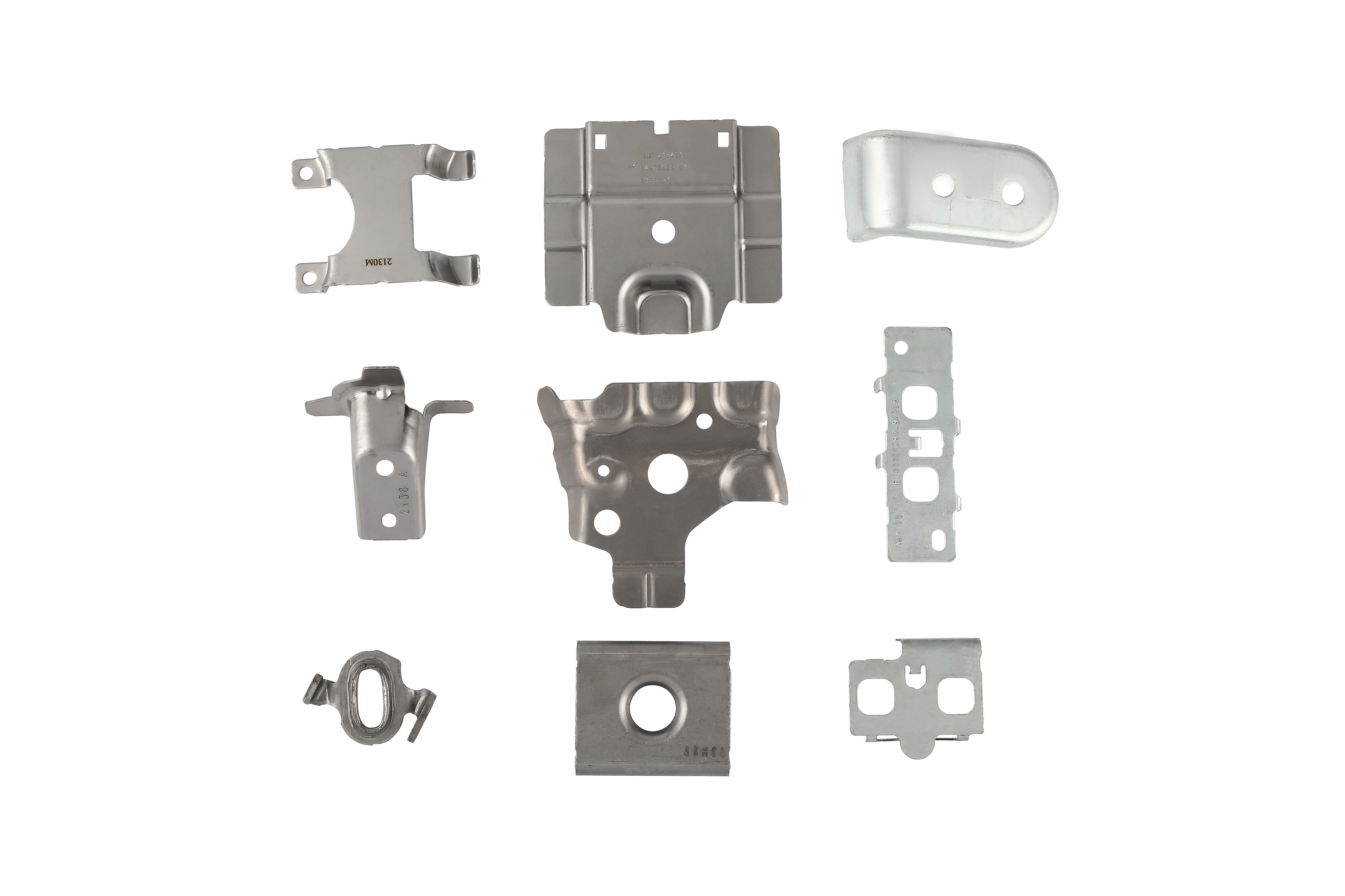 examples of common defects in stamped metal parts including cracks wrinkles and surface marks
