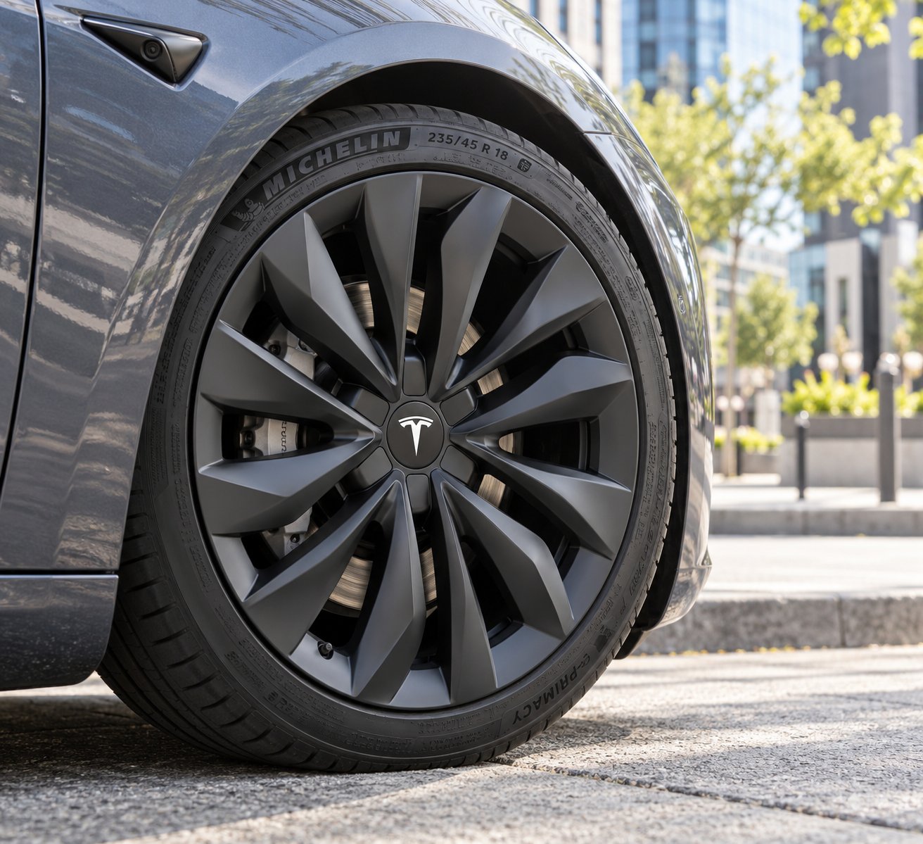 premium aftermarket wheel cover on a tesla model 3 18 inch rim delivering a sport wheel aesthetic