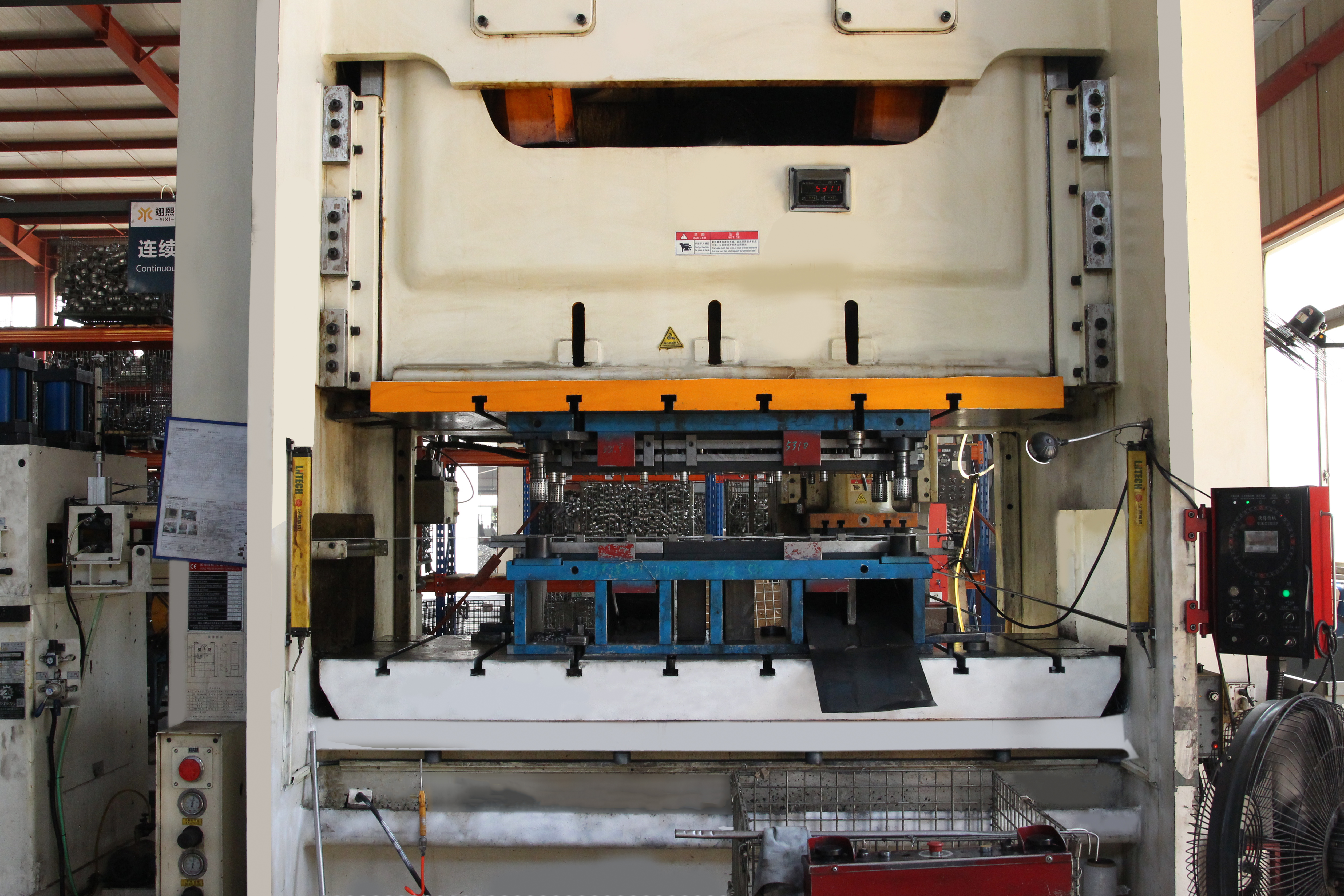 sheet metal stamping press transforming metal into automotive components