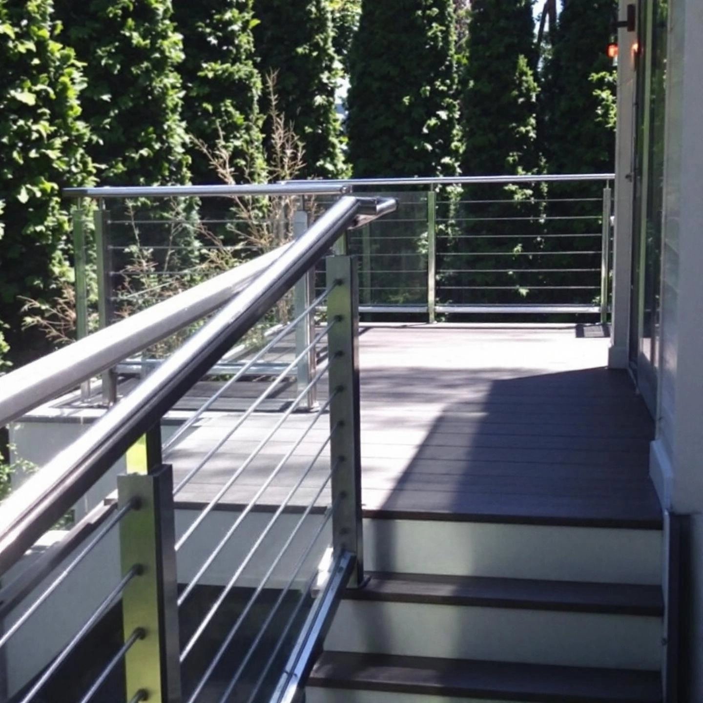 contemporary deck featuring aluminum balusters and decking for a unified stylish outdoor space