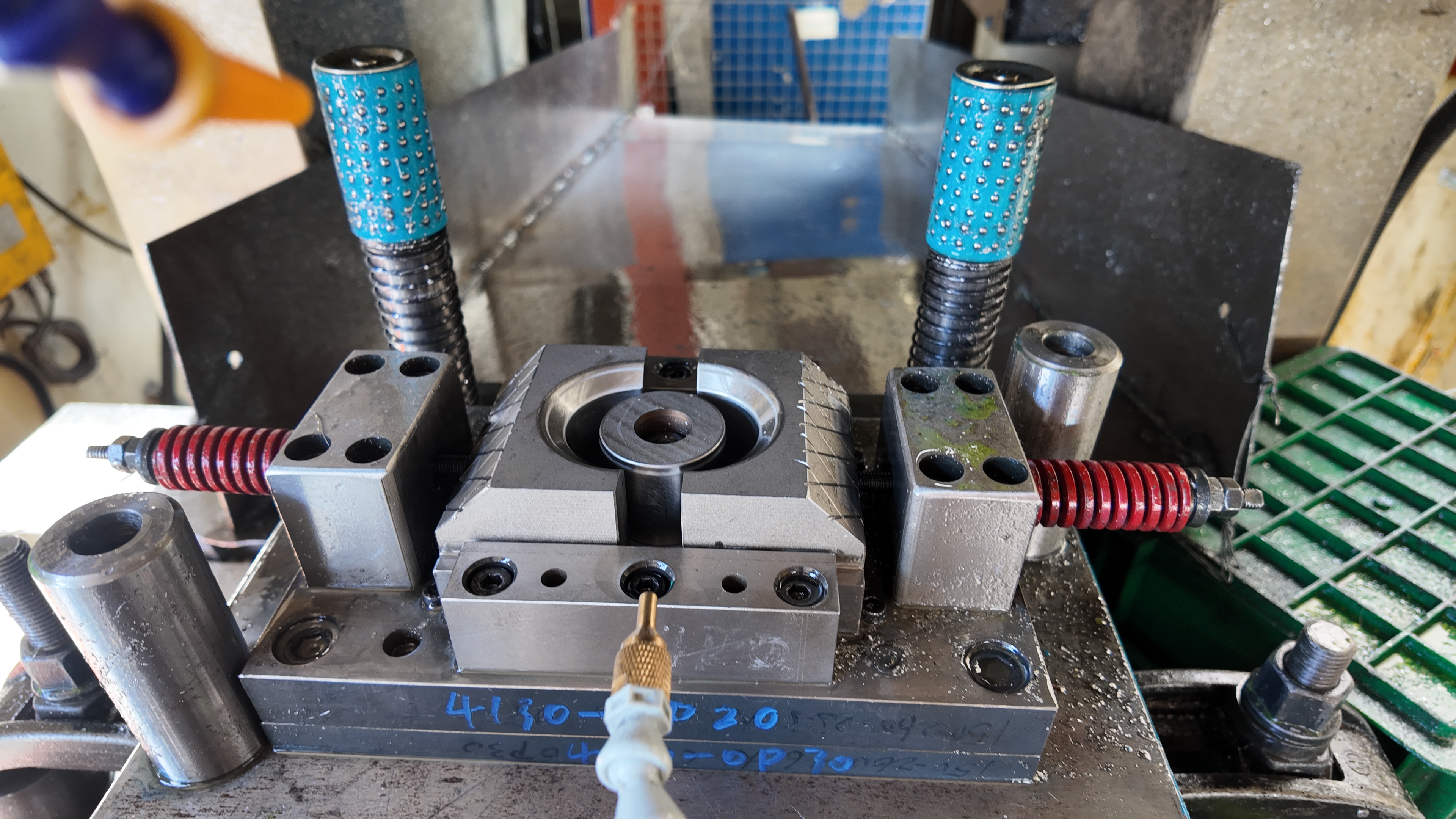 sheet metal punch and die set showing clearances bend radii and feature spacing