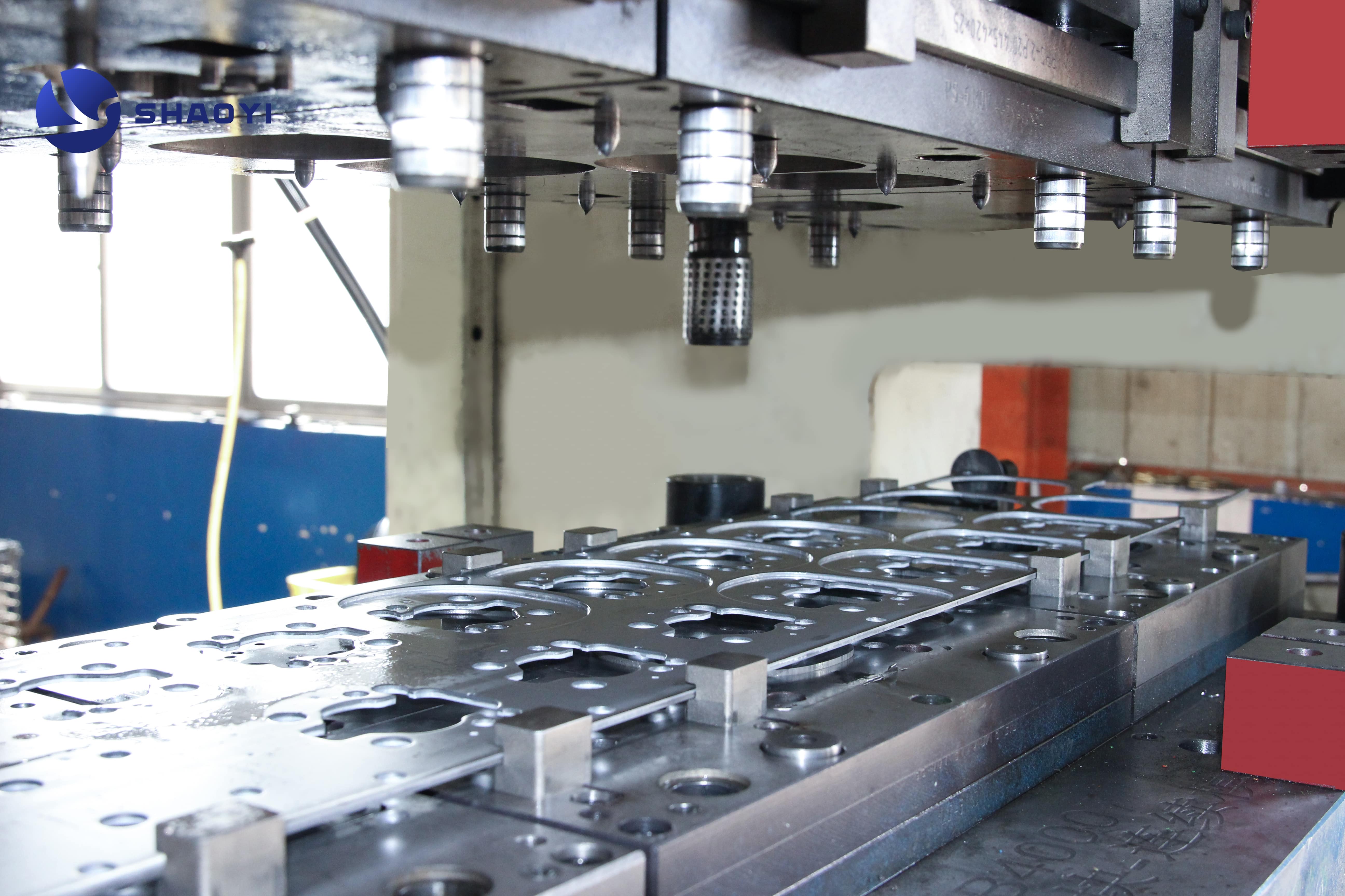 precision stamping equipment creating small detailed automotive parts