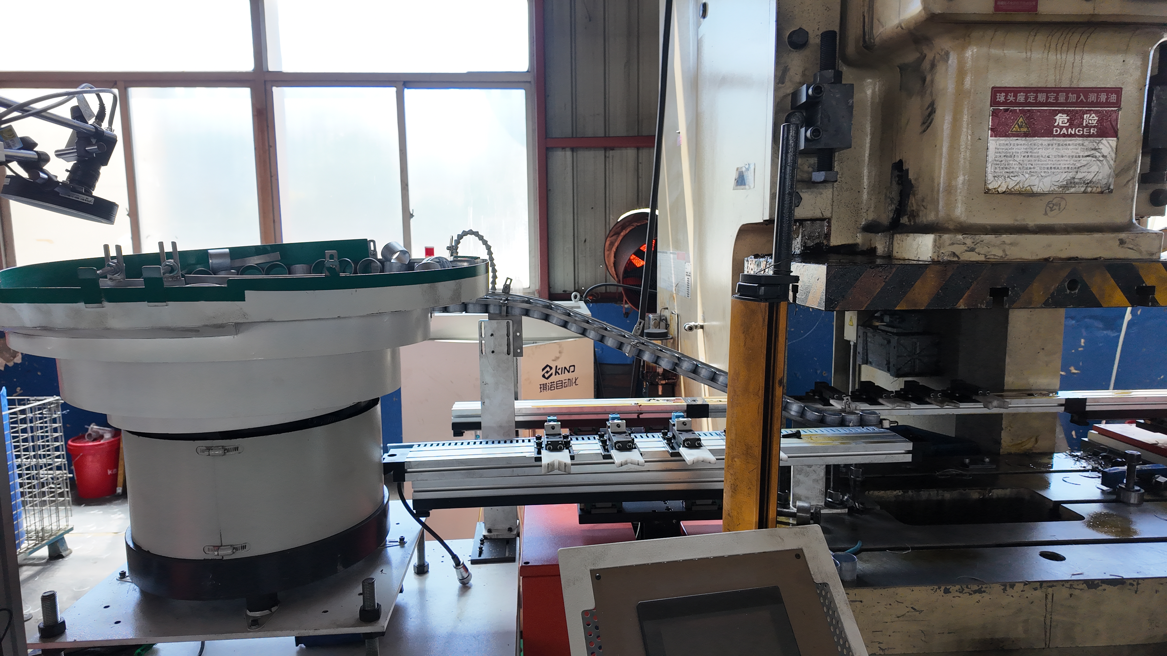 step by step workflow of transfer die stamping in a factory setting