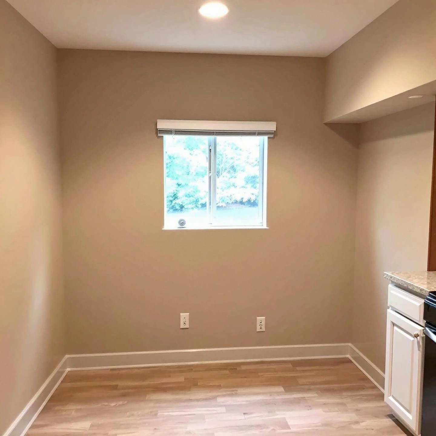 basement room with a window ventilation fan ensuring fresh dry air
