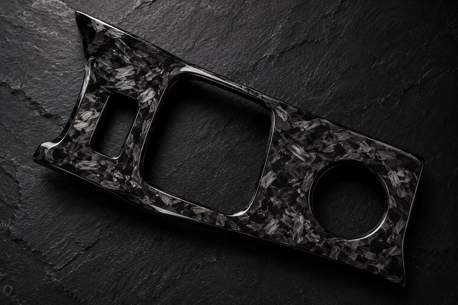 forged carbon fiber with its distinctive marbled swirl pattern created by randomly oriented chopped fibers