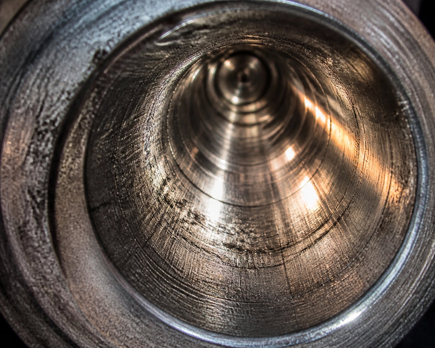 close up view of barrel bore wear patterns that indicate degradation during polymer processing