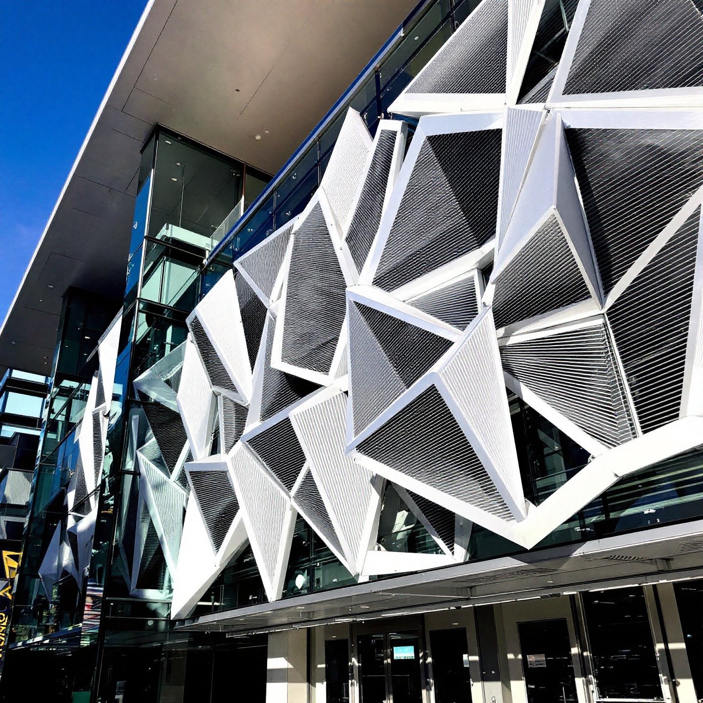commercial building utilizing aluminium louvres for sun shading and ventilation