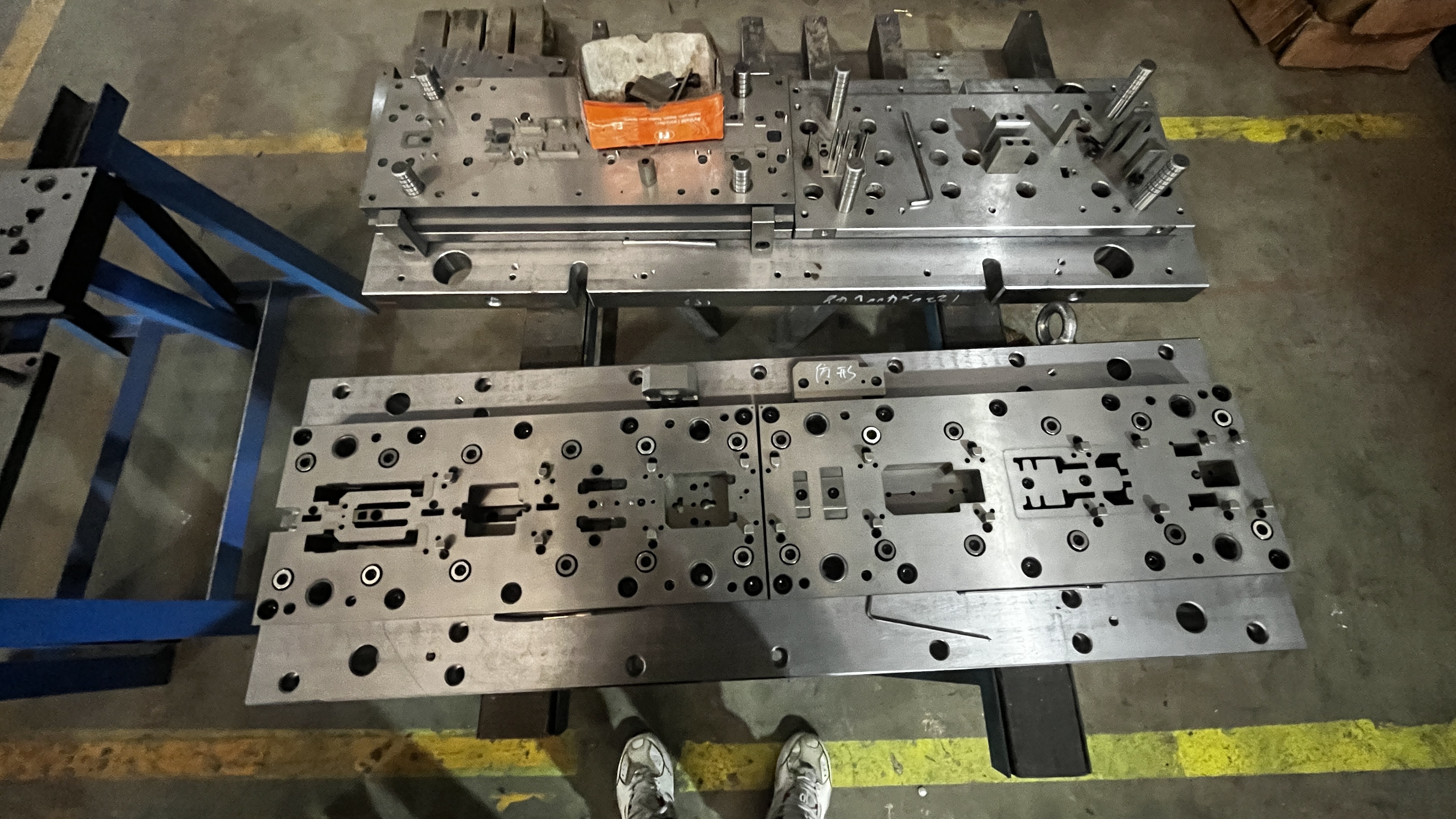 variety of metal stamping dies and tooling components used in press operations