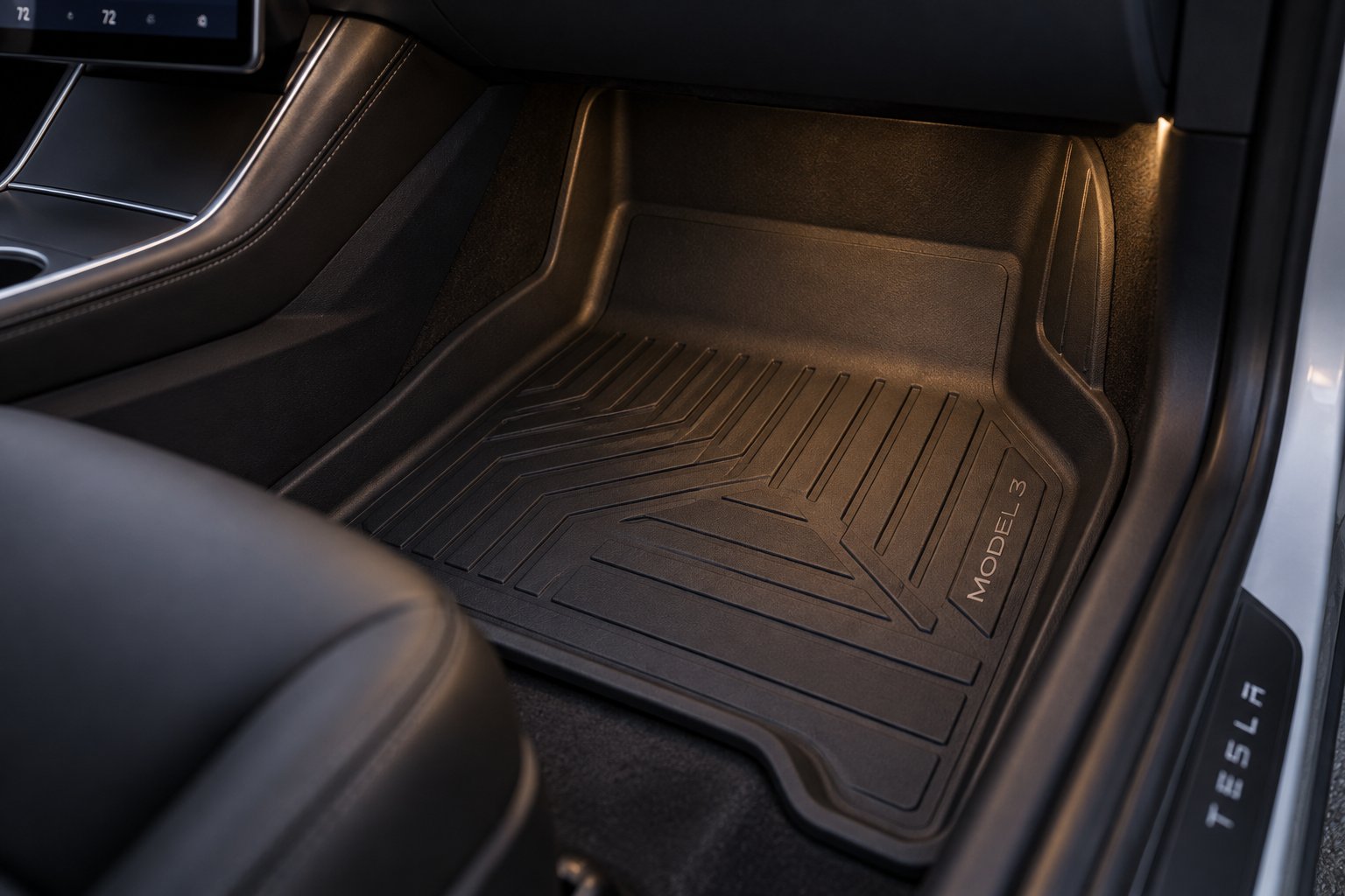 precision fit floor mat seated flush against a tesla model 3 footwell and console edge