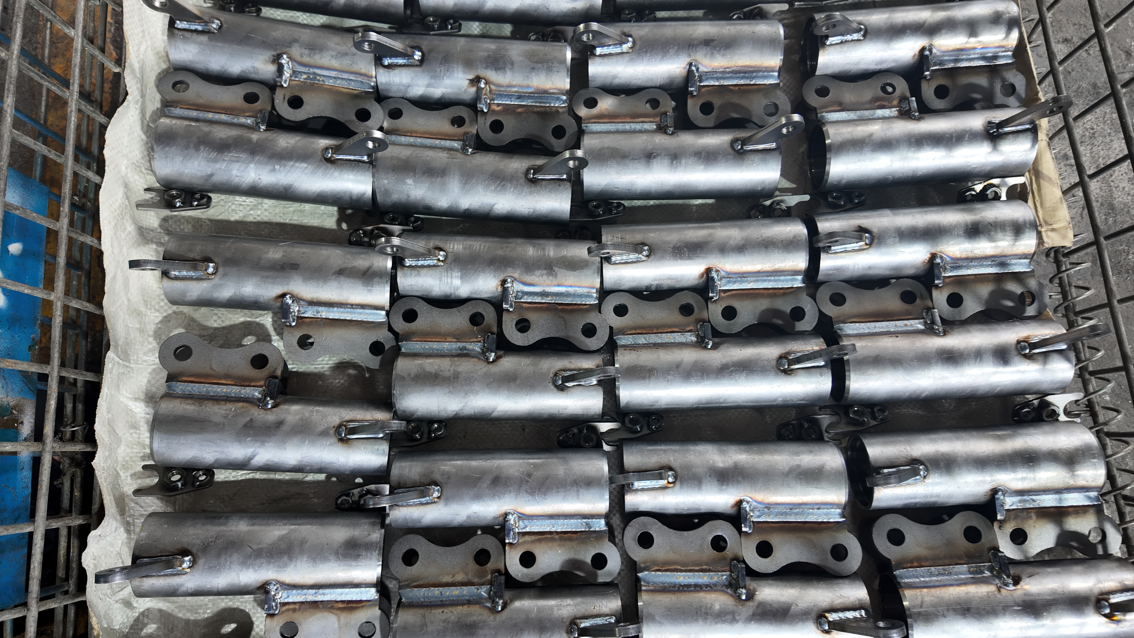 mechanic inspecting oem automotive parts for precise fit and quality assurance